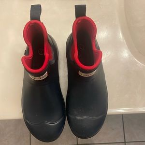 Hunter rain boots.